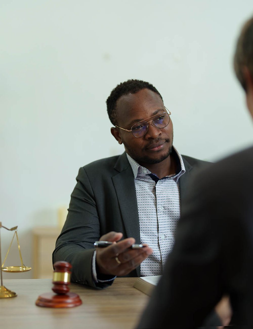 african american attorney, lawyers discussing contract or business agreement at law firm office, Business people making deal document legal, justice advice service concepts.